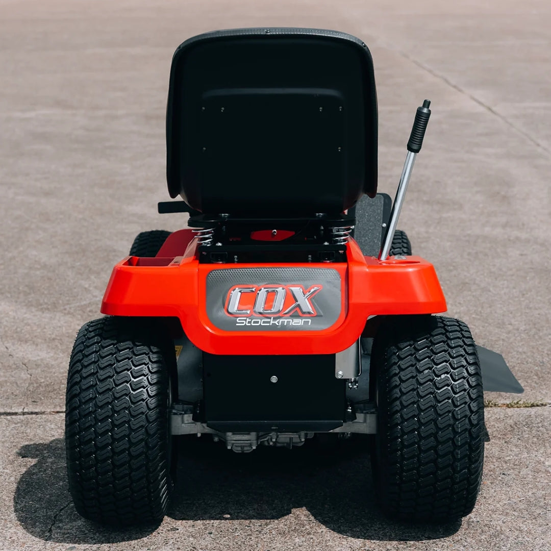Photo of the Cox Stockman ride on mower parked on concrete