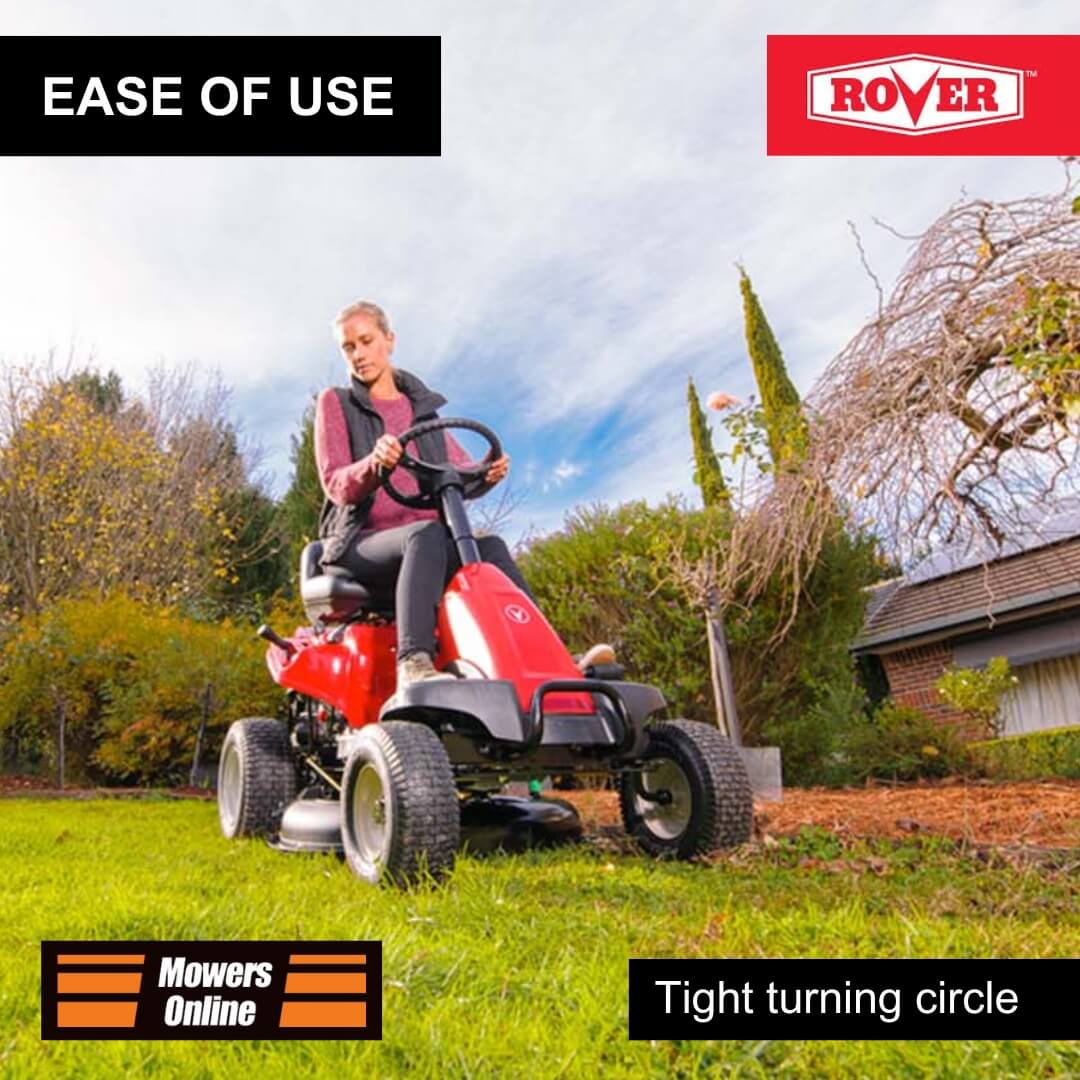 Person using a red lawn mower with 'Rover' branding on a grassy area.