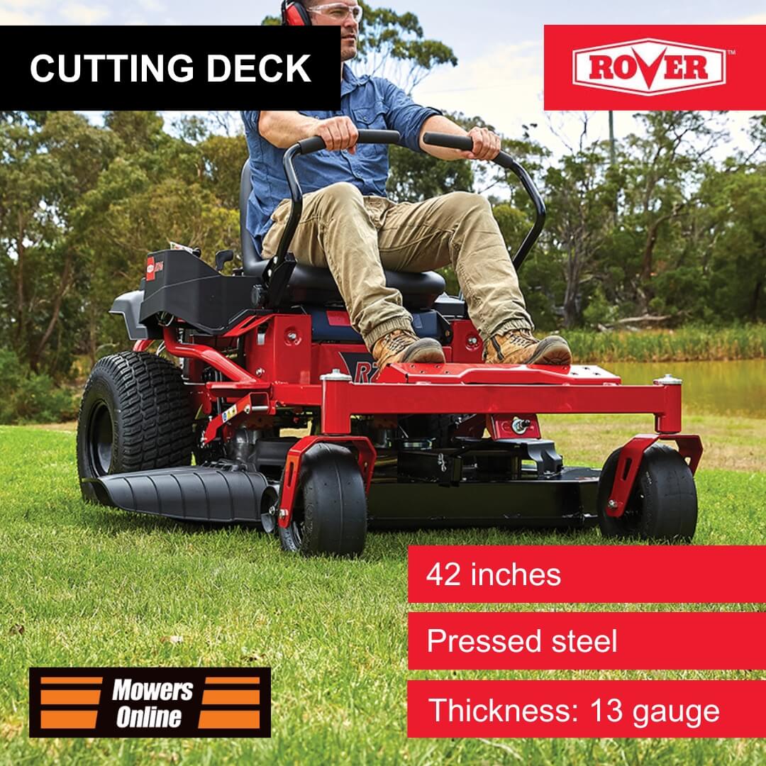 Man operating a red riding lawn mower with text highlighting features on a grassy field.