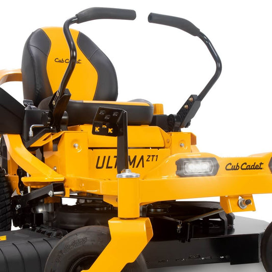 Yellow Cub Cadet lawn mower with black seat and handle on a white background