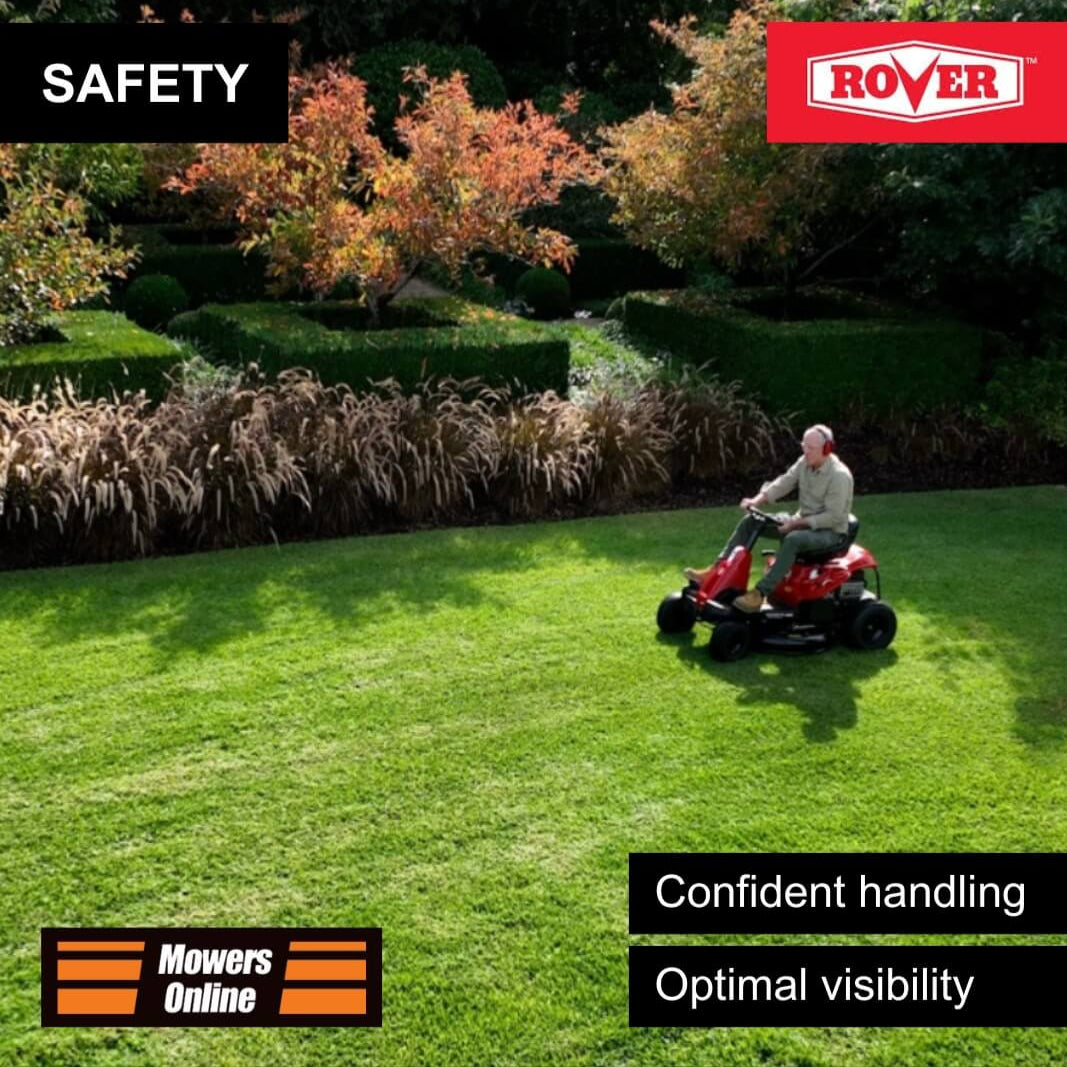 Man riding a red lawnmower on a green lawn with 'Rover' branding and safety features text.