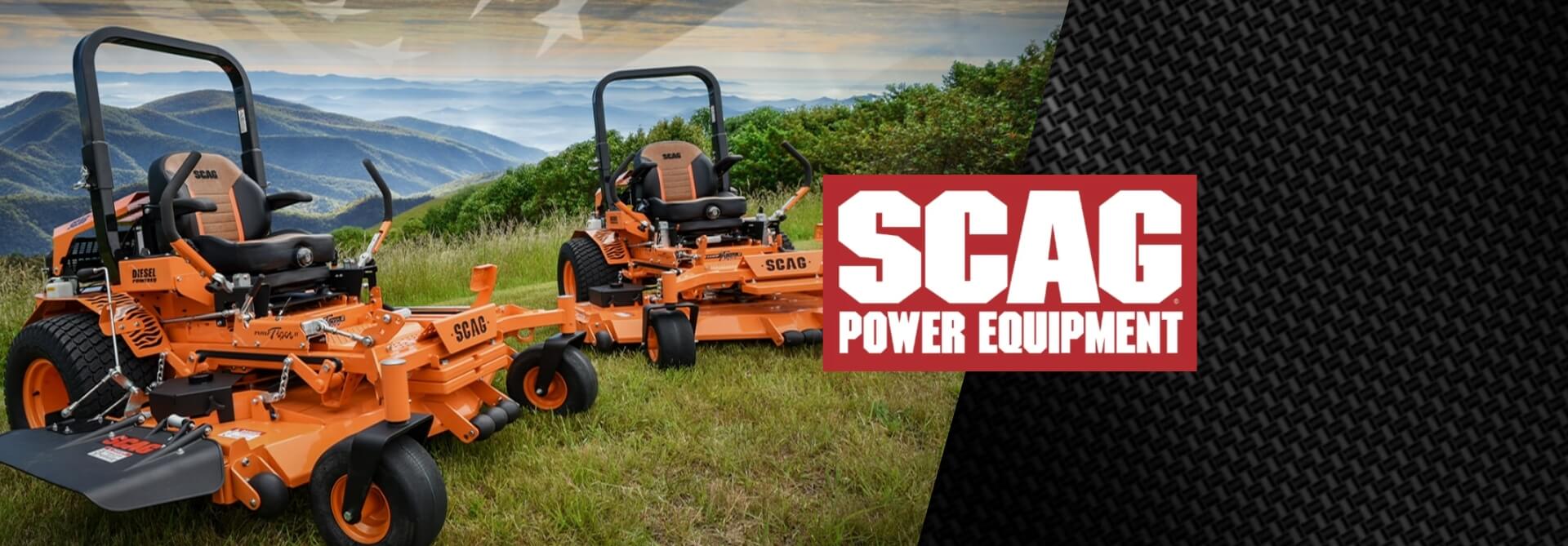 Two orange SCAG zero-turn mowers on a grassy field with mountains in the background, featuring the SCAG Power Equipment logo.