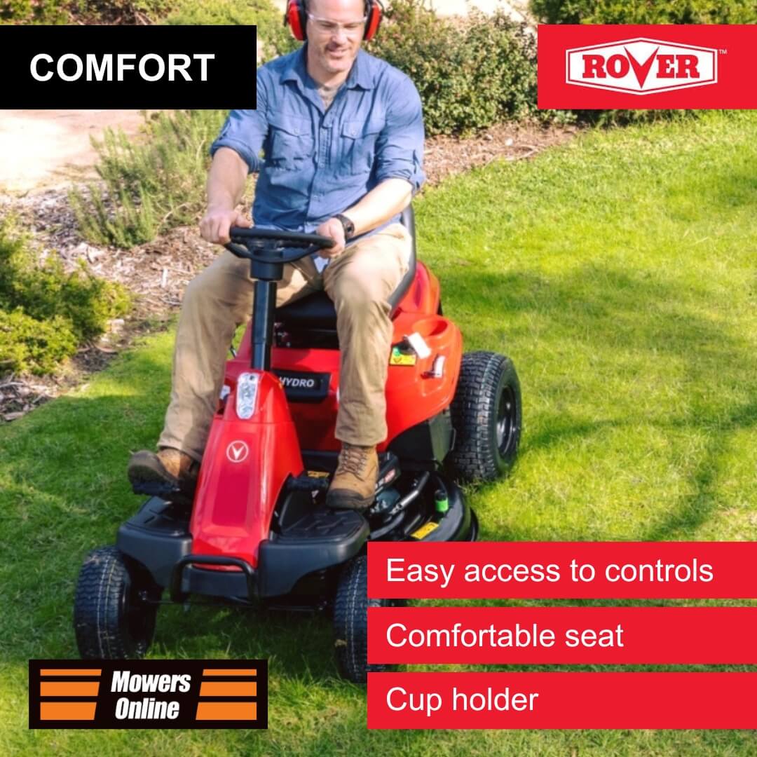 Man operating a red Rover lawn mower on grass with text highlighting comfort features.