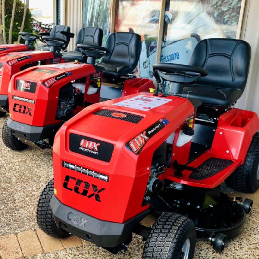 Image showing a row of Cox Stockman ride on mowers
